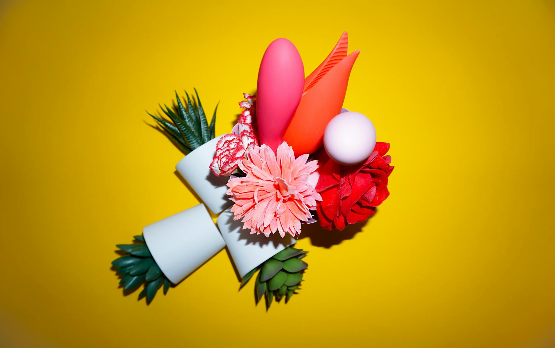 A close-up arrangement of colorful vibrators displayed together